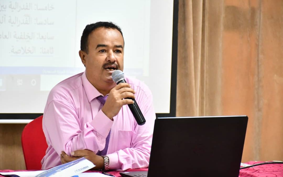 البروفسور الدكتور فضل الربيعي يهني زميله  د. محمد الطيار حصوله على   لقب الأستاذية