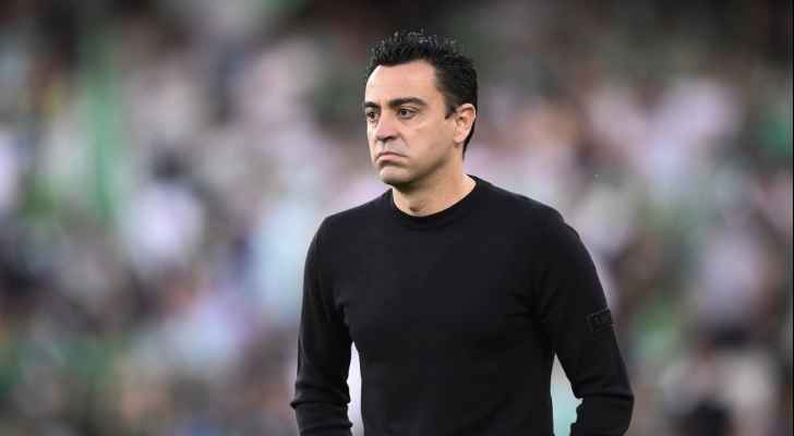 تشافي يتهم ريال مدريد بالحملة ضد لابورتا